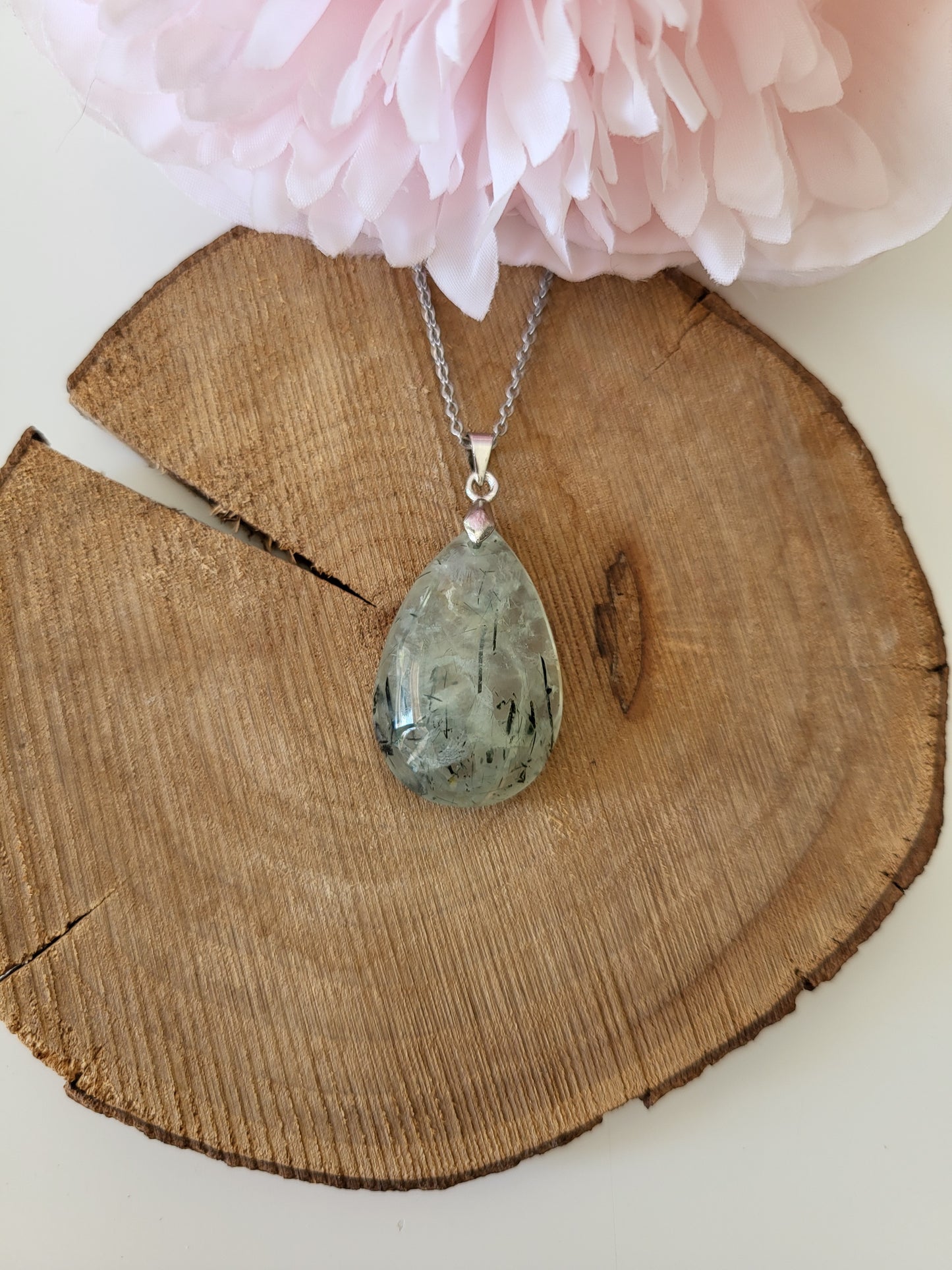 Necklace with prehnite pendant and tourmaline inclusions