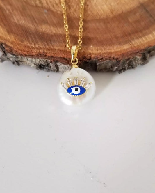 Collier pendentif œil protecteur porte-bonheur.